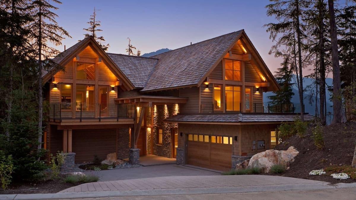 Kadenwood 2939 Chalet exterior with wooden features at sunset